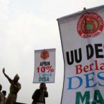 Mengawasi Dana Desa